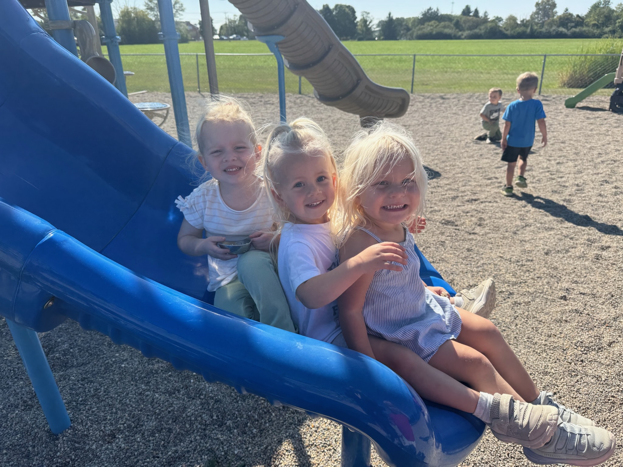 Three-year-olds enjoying active, hands-on play at River of Life Daycare